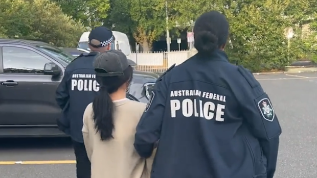 Australia's federal and intelligence officers have charged two more Chinese nationals with foreign interference after they allegedly collected information about a Buddhist association in Canberra. 
