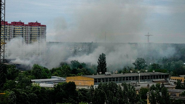 Smoke rises after a Russian missile strike in Kyiv, Ukraine, Sunday, June 5, 2022. (AP Photo/Natacha Pisarenko)