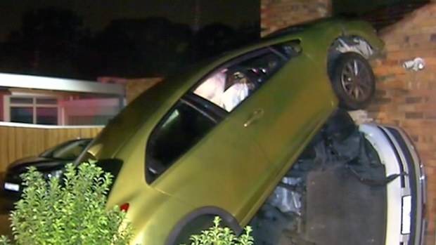 It crashed through the fence and into the van with enough force it tipped the vehicle on its side.