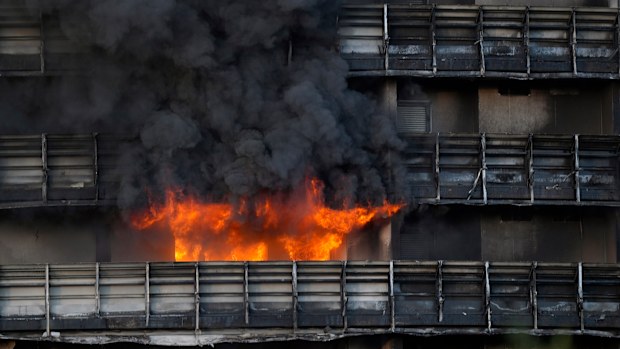 Firefighters were battling a blaze on Sunday that spread rapidly through a recently restructured 60-meter-high, 16-story residential building in Milan. 