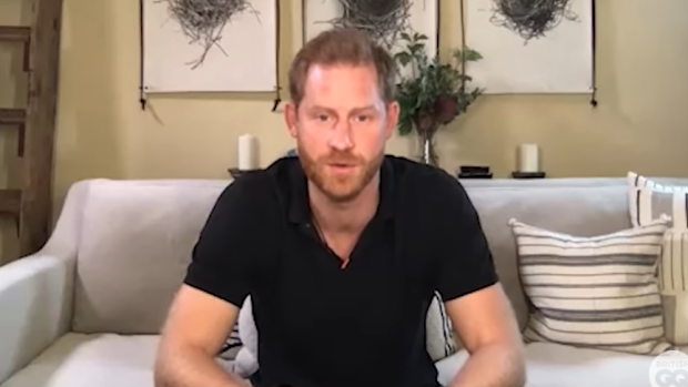 Patrick Hutchinson with Prince Harry