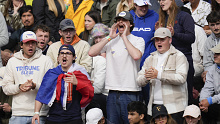 Tennis fans scream during second round matches of the French Open.