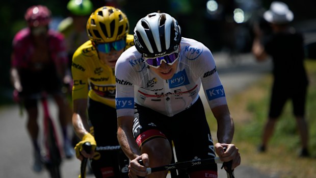 Slovenia's Tadej Pogacar tries to break away from Denmark's Jonas Vingegaard.