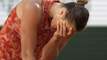 Aryna Sabalenka of Belarus reacts after missing a shot against Russia's Mirra Andreeva.