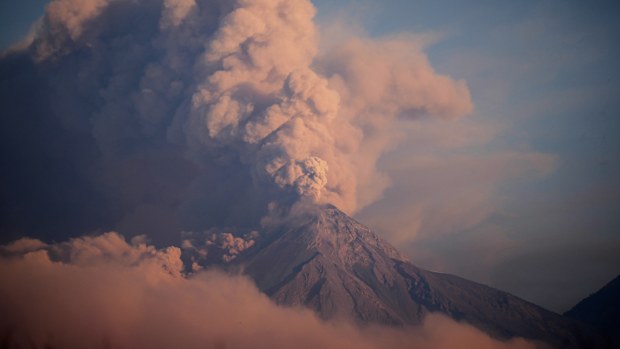 The "Volcan de Fuego," or Volcano of Fire, blows a thick cloud of ash seen from Palin, Guatemala, Monday, March 10, 2025. 