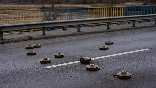Anti-tank mines are spread out on a bridge in Bucha, on the outskirts of Ukraine's capital Kyiv. 