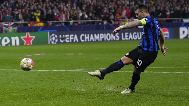 Inter Milan's Lautaro Martinez misses in the penalty shootout during the Champions League, round of 16, second leg soccer match between Atletico Madrid and Inter Milan at the Metropolitano stadium in Madrid.