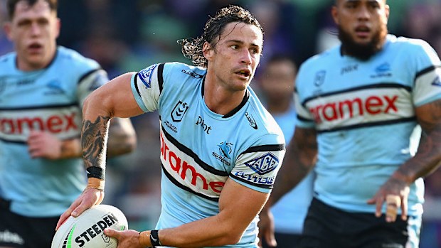 Nicho Hynes of the Sharks passes.