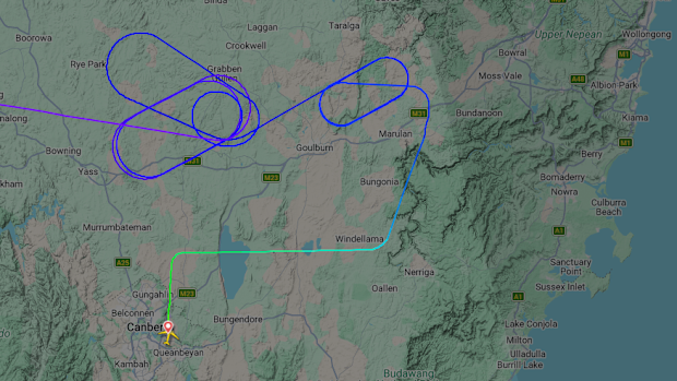 A map of the flight shows the plane circled over NSW before diverting to Canberra.