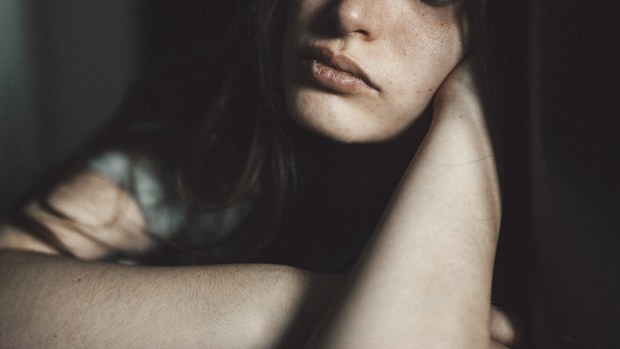 Young women struggling with depression and loneliness.