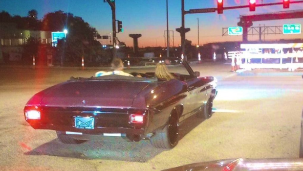 Taylor Swift and Travis Kelce getting away in his car following the Chiefs game.