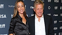 Grant shares daughters Blue, six, Lulu, eight, and son John Mungo, 12, with his wife Anna Eberstein, 41.