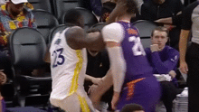 Draymond Green makes contact to Nurkic's face.