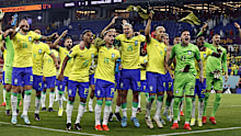 Brazil players celebrate at the 2022 World Cup in Qatar.
