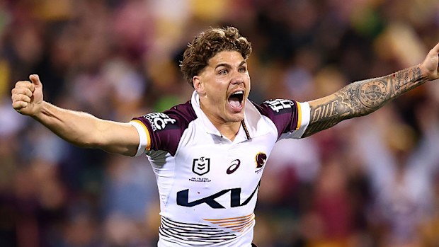 Reece Walsh celebrates after the Broncos defeated the Raiders in the finals.