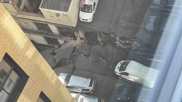 This photo provided by Charlie Franklin shows the partially collapsed parking garage in lower Manhattan.