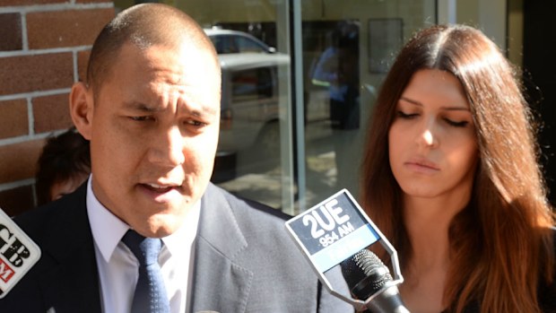 Olympian Geoff Huegill and his wife Sara Hills leave Waverley Local Court in Sydney (AAP Image/Dean Lewins)