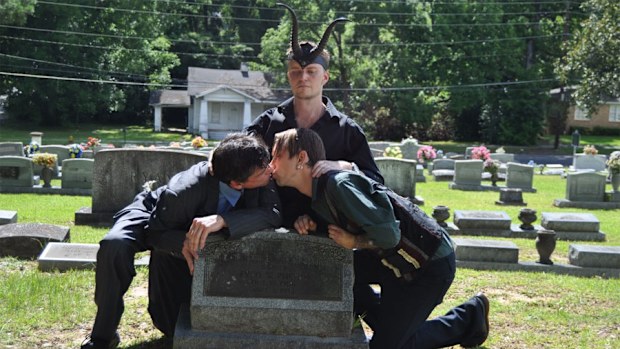 The Satanic Temple conducts a "Pink Mass" at the gravesite of Fred Phelps Snr's mother in 2013, which it claims made her gay in the afterlife (Satanic Temple)