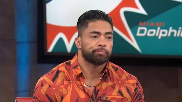 Manti Te'o holds back tears.