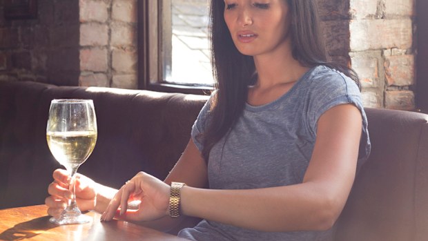Woman stood up on date.
