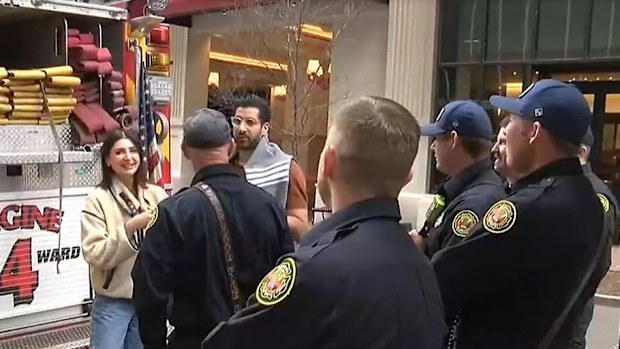 bride and groom trapped in hotel lift wedding