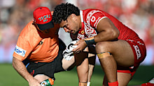 Eli Katoa is seen speaking with Tongan trainers.