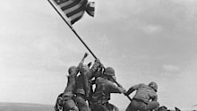 The iconic photo of US Marines of the 28th Regiment, 5th Division, raising the American flag atop Mt Suribachi in Iwo Jima, on February 23, 1945. Iwo Jima was the site of one of the bloodiest and famous battles of World War II against Japan.