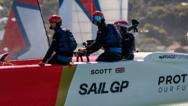 Team Great Britain helmed by Giles Scott race during SailGP in New Zealand.