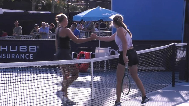 Yelyzaveta Kotliar and Vlada Mincheva shake hands after their Australian Open juniors match.
