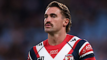 Connor Watson in action during warm-up for the Roosters.