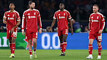 Liverpool react after conceding a goal.