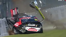 Scott Pye's car spins heavily into the pit wall.