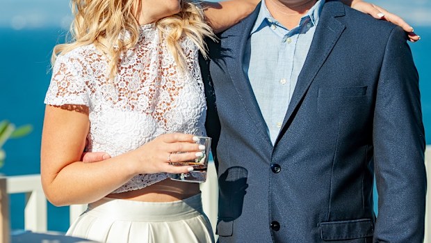 Bride Having a Drink and Embracing her New Brother-In-Law After Wedding Ceremony