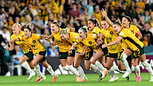 Players of Australia celebrate their side's victory in the penalty shoot out after Cortnee Vine of Australia scores her team's tenth penalty.