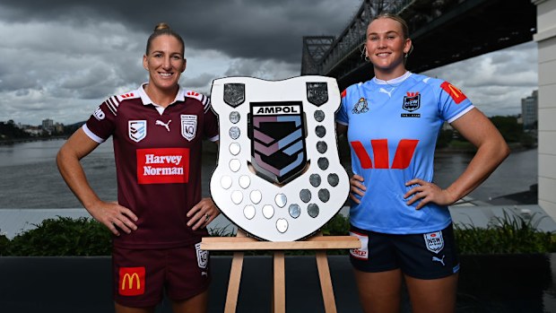 Ali Brigginshaw of Queensland and Jaime Chapman of NSW with Women's State of Origin shield. 