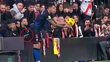 Lucas Ocampos had his backside poked by an opposing fan while taking a throw-in during Sevilla's match against Rayo.