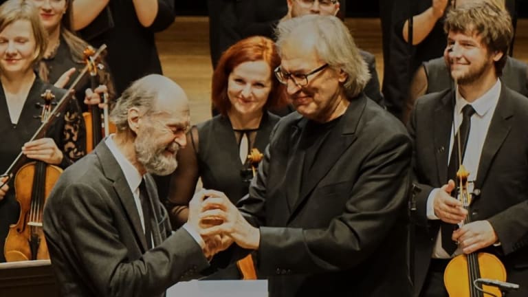  Arvo Part (left) on stage with conductor Tonu Kaljuste.