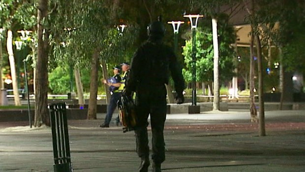 Police at the scene last night. (9NEWS)