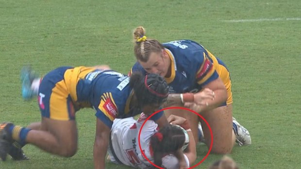 Dragons winger Madison Bartlett allegedly bites the arm of Eels opponent Sereana Naitokatoka.