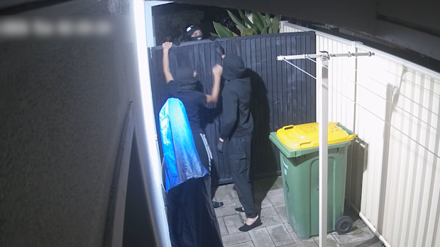 Police said four people wearing face coverings forced their way into a unit in Mermaid Waters at 1.30am today.