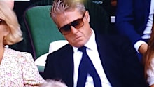 Hugh Grant seems to fall asleep at Wimbledon 