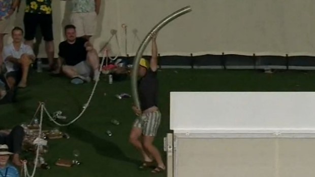 'Beer snake man' in action at the Adelaide Oval.