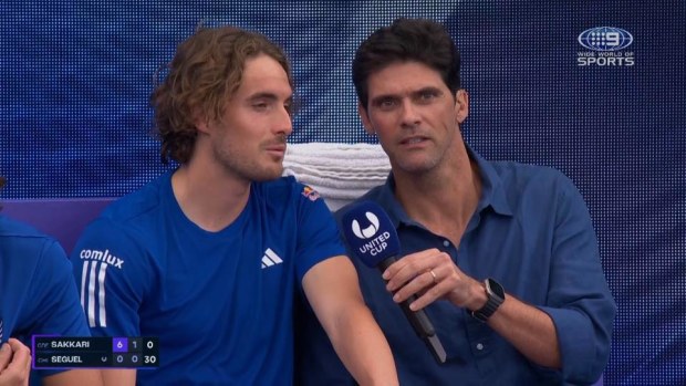 Stefanos Tsitsipas speaks to Mark Philippoussis during Nine's United Cup coverage.
