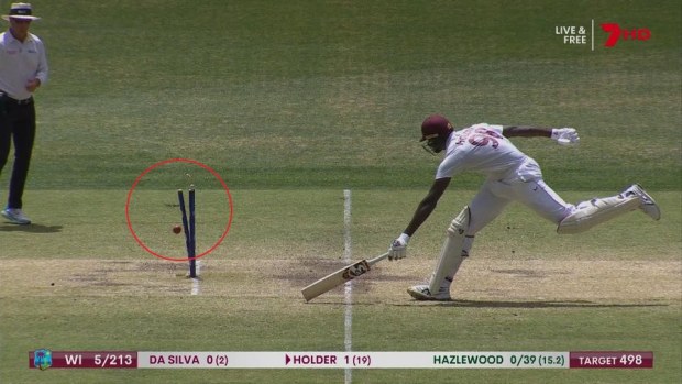 Jason Holder gets his bat down in time.