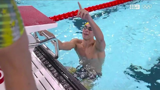 Thomas Neill celebrates bronze in the men's 4x200m freestyle.