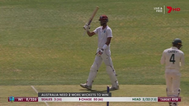 Roston Chase of the West Indies brings up his half century.