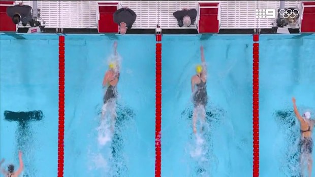 Ariarne Titmus touches the wall ahead of Mollie O'Callaghan in their 200m freestyle semi.