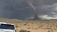In this photo released by the Navajo Police Department, a tornado funnel is seen Saturday, September 13, 2025, northeast of Montezuma Creek, Utah. (Navajo Police Department via AP)