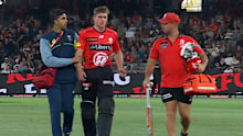 Harry Dixon walks off.