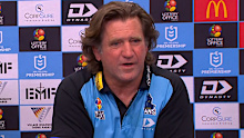 Des Hasler bristles at a question for a reporter during his post-match press conference.